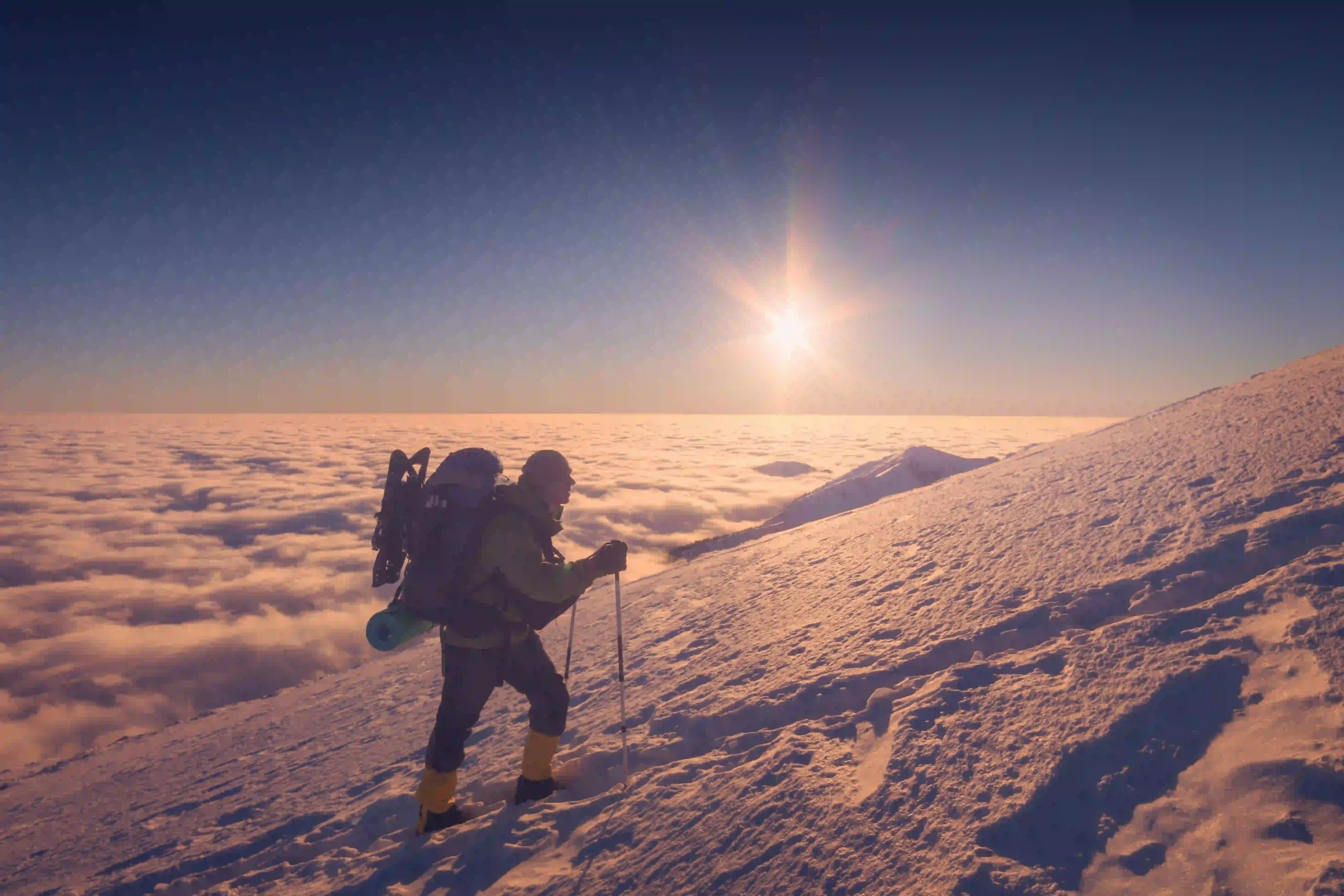 Climber ascending toward Uhuru Peak on summit night